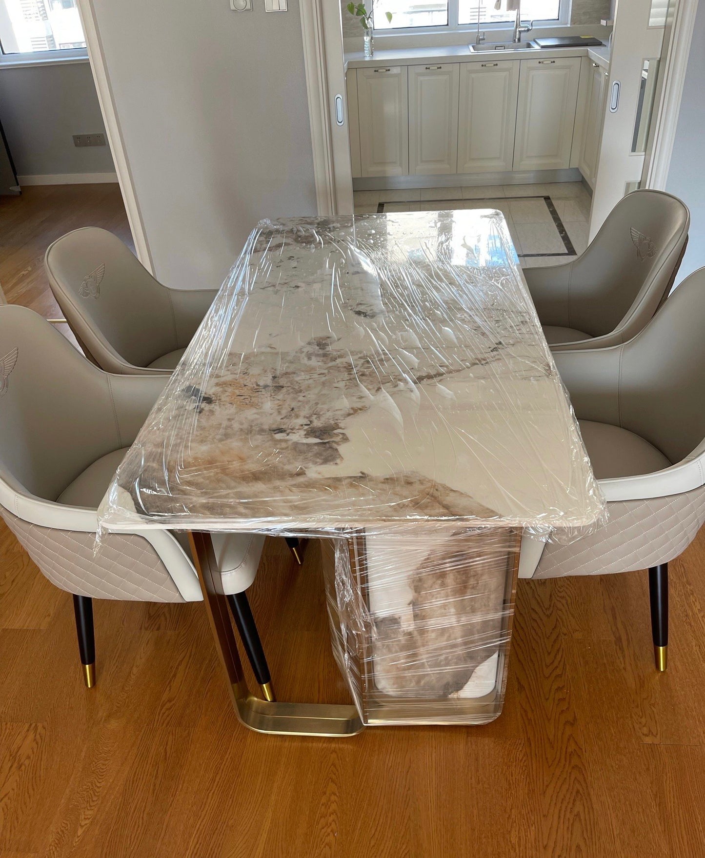 Slim natural marble dining table luxury home design elegant stainless steel art